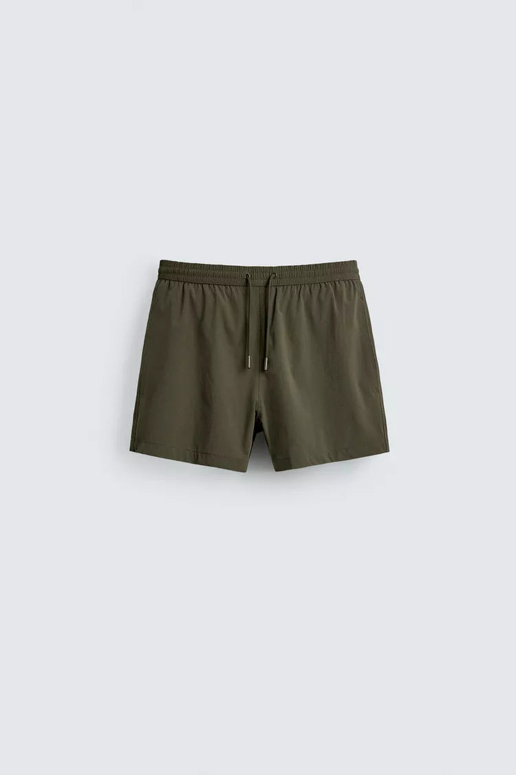 KORTE ZWEMSHORT MET STRUCTUUR