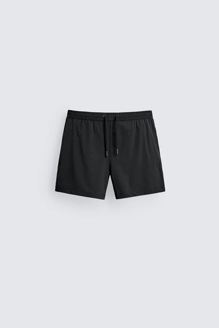 KORTE ZWEMSHORT MET TEXTUUR
