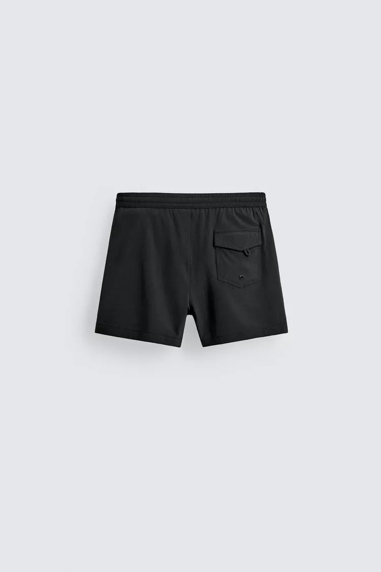 KORTE ZWEMSHORT MET TEXTUUR