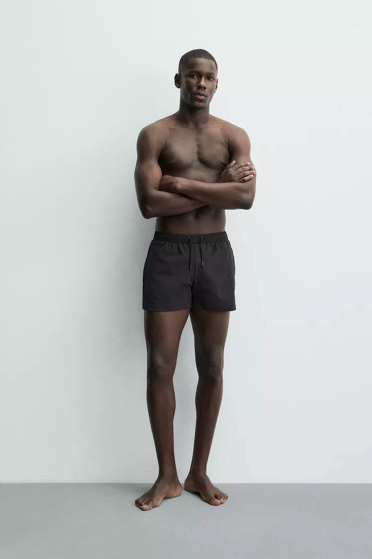 KORTE ZWEMSHORT MET TEXTUUR